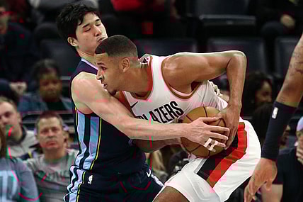 Mar 1, 2024; Memphis, Tennessee, USA; Portland Trail Blazers forward Kris Murray (8) drives to the basket as Memphis Grizzlies forward Yuta Watanabe (18) defends during the second half at FedExForum. Mandatory Credit: Petre Thomas-USA TODAY Sports