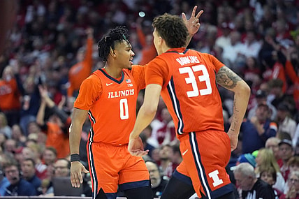 Mar 2, 2024; Madison, Wisconsin, USA; Illinois Fighting Illini guard Terrence Shannon Jr. (0) celebrates scoring a three-point basket with teammate Illinois Fighting Illini forward Coleman Hawkins (33) during the first half against the Wisconsin Badgers at the Kohl Center. Mandatory Credit: Kayla Wolf-USA TODAY Sports