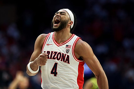 Mar 2, 2024; Tucson, Arizona, USA; Arizona Wildcats guard Kylan Boswell (4) celebrates after a three point basket against the Oregon Ducks during the first half at McKale Center. Mandatory Credit: Zachary BonDurant-USA TODAY Sports