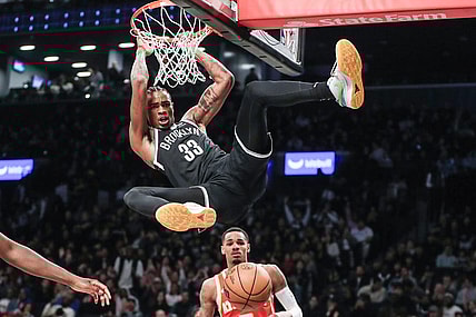 Mar 2, 2024; Brooklyn, New York, USA;  Brooklyn Nets center Nic Claxton (33) dunks in the fourth quarter against the Atlanta Hawks at Barclays Center. Mandatory Credit: Wendell Cruz-USA TODAY Sports
