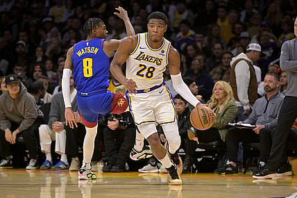 Mar 2, 2024; Los Angeles, California, USA;  Los Angeles Lakers forward Rui Hachimura (28) drives past Denver Nuggets guard Christian Braun (0) in the second half at Crypto.com Arena. Mandatory Credit: Jayne Kamin-Oncea-USA TODAY Sports