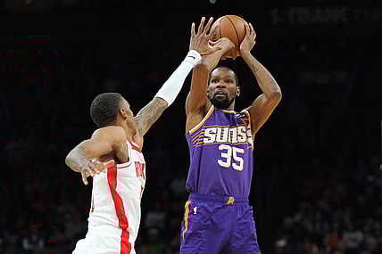 Mar 2, 2024; Phoenix, Arizona, USA; Phoenix Suns forward Kevin Durant (35) shoots against the Houston Rockets during the second half at Footprint Center. Mandatory Credit: Joe Camporeale-USA TODAY Sports