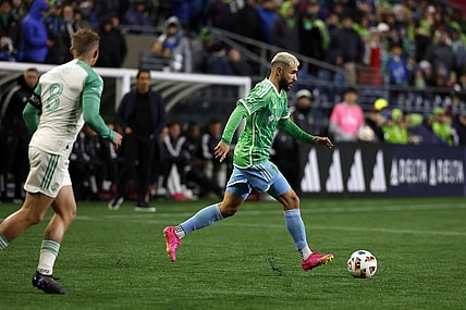 Mar 2, 2024; Seattle, Washington, USA; Seattle Sounders FC defender Alex Roldan (16) controls the ball against Austin FC midfielder Alex Ring (8) during the second half at Lumen Field. Mandatory Credit: Joe Nicholson-USA TODAY Sports