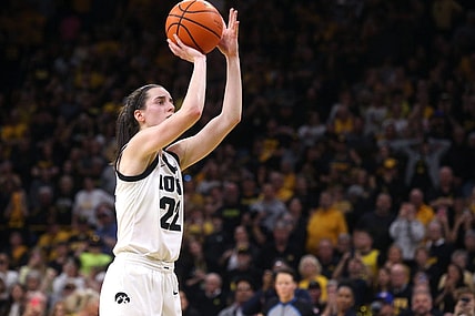 Iowa   s Caitlin Clark (22) breaks Pete Maravich   s NCAA Division I scoring record while playing Ohio State Sunday, March 3, 2024 at Carver-Hawkeye Arena in Iowa City, Iowa.