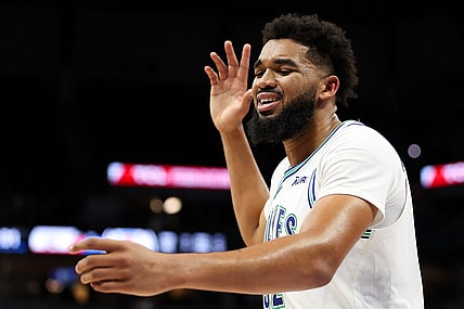 Mar 3, 2024; Minneapolis, Minnesota, USA; Minnesota Timberwolves center Karl-Anthony Towns (32) reacts after being charged with a foul against the LA Clippers during the second half at Target Center. Mandatory Credit: Matt Krohn-USA TODAY Sports