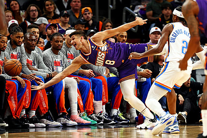 Mar 3, 2024; Phoenix, Arizona, USA; Phoenix Suns guard Grayson Allen (8) tries to save the ball from going out of bounds against Oklahoma City Thunder guard Shai Gilgeous-Alexander (2) during the first quarter at Footprint Center. Mandatory Credit: Mark J. Rebilas-USA TODAY Sports