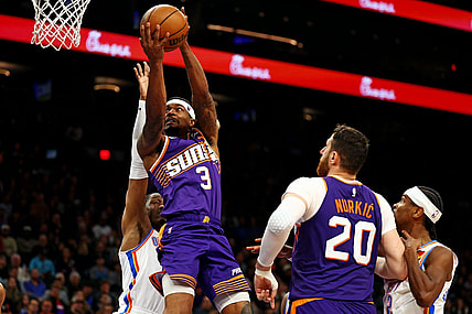 Mar 3, 2024; Phoenix, Arizona, USA; Phoenix Suns guard Bradley Beal (3) shoots the ball against Oklahoma City Thunder guard Shai Gilgeous-Alexander (2) at Footprint Center. Mandatory Credit: Mark J. Rebilas-USA TODAY Sports