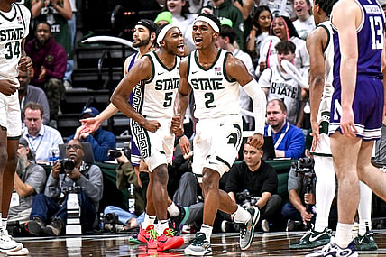 Michigan State's Tyson Walker, right, and Tre Holloman celebrate a Northwestern turnover during the second half on Wednesday, March 6, 2024, at the Breslin Center in East Lansing.