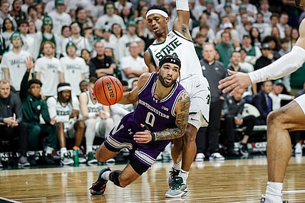 Michigan State guard Tyson Walker (2) defends Northwestern guard Boo Buie (0) during the first half at Breslin Center in East Lansing on Wednesday, March 6, 2024.