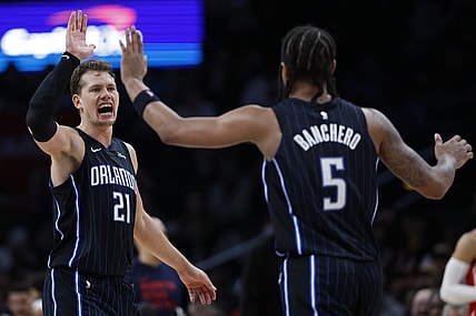 Mar 6, 2024; Washington, District of Columbia, USA; Orlando Magic center Moritz Wagner (21) celebrates with Orlando Magic forward Paolo Banchero (5) /against the Washington Wizards in the second half at Capital One Arena. Mandatory Credit: Geoff Burke-USA TODAY Sports