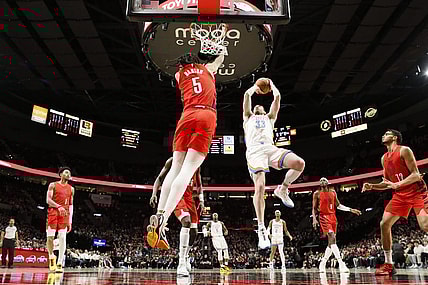 Mar 6, 2024; Portland, Oregon, USA; Oklahoma City Thunder small forward Gordon Hayward (33) shoots the ball over Portland Trail Blazers guard Dalano Barton (5) during the second half at Moda Center. Mandatory Credit: Soobum Im-USA TODAY Sports