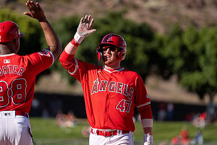Mar 8, 2024; Tempe, Arizona, USA; Los Angeles Angels infielder Sam Brown (47) celebrates after hitting the go ahead run in the ninth to score outfielder Jordyn Adams (39) (not shown) in the ninth during a spring training game against the Colorado Rockies at Tempe Diablo Stadium. Mandatory Credit: Allan Henry-USA TODAY Sports