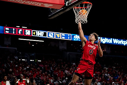 Cincinnati Bearcats guard Dan Skillings Jr. (0) goes up for an open dunk in the second half of the NCAA basketball game between Cincinnati Bearcats and West Virginia Mountaineers at Fifth Third Arena in Cincinnati on Saturday, March 9, 2024.