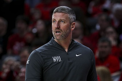 Mar 9, 2024; Cincinnati, Ohio, USA; West Virginia Mountaineers interim head coach Josh Eilert during the first half against the Cincinnati Bearcats at Fifth Third Arena. Mandatory Credit: Katie Stratman-USA TODAY Sports