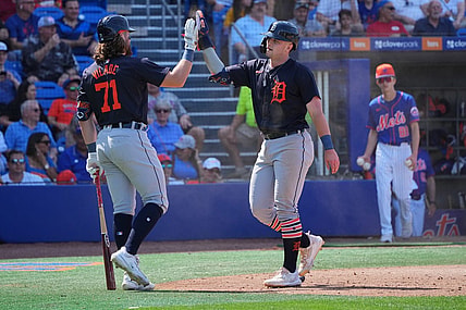 Mar 10, 2024; Port St. Lucie, Florida, USA;  Detroit Tigers second baseman Jace Jung (84) is congratulated by first baseman Ryan Vilade (71) for scoring a run in the eighth inning against the New York Mets at Clover Park. Mandatory Credit: Jim Rassol-USA TODAY Sports