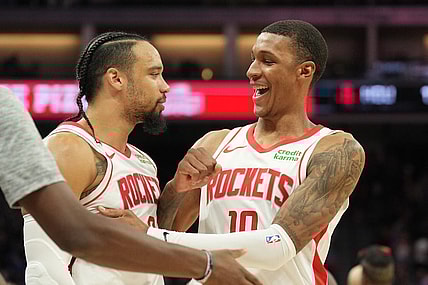 Mar 10, 2024; Sacramento, California, USA; Houston Rockets forwards Dillon Brooks (left) and Jabari Smith Jr. (right) celebrate after defeating the Sacramento Kings at Golden 1 Center. Mandatory Credit: Darren Yamashita-USA TODAY Sports