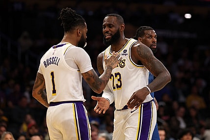 Mar 10, 2024; Los Angeles, California, USA;  Los Angeles Lakers forward LeBron James (23) greets guard D'Angelo Russell (1) after Russell scored a basket during the second quarter against the Minnesota Timberwolves at Crypto.com Arena. Mandatory Credit: Kiyoshi Mio-USA TODAY Sports