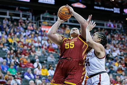 Mar 11, 2024; Kansas City, MO, USA; Iowa State Cyclones center Audi Crooks (55) shoots the ball around Oklahoma Sooners forward Skylar Vann (24) during the second half at T-Mobile Center. Mandatory Credit: William Purnell-USA TODAY Sports