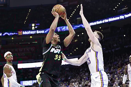 Mar 12, 2024; Oklahoma City, Oklahoma, USA; Indiana Pacers center Myles Turner (33) shoots as Oklahoma City Thunder forward Gordon Hayward (33) defends during the second half at Paycom Center. Mandatory Credit: Alonzo Adams-USA TODAY Sports