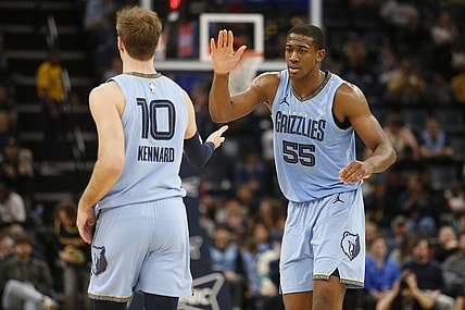 Mar 12, 2024; Memphis, Tennessee, USA; Memphis Grizzlies center Trey Jemison (55) reacts with guard Luke Kennard (10) during the second half against the Washington Wizards at FedExForum. Mandatory Credit: Petre Thomas-USA TODAY Sports