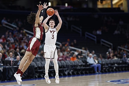 Mar 13, 2024; Washington, D.C., USA; Virginia Tech Hokies guard Sean Pedulla (3) shoots the ball as Florida State Seminoles guard Jalen Warley (1) defends in the first half at Capital One Arena. Mandatory Credit: Geoff Burke-USA TODAY Sports