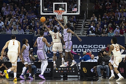 Mar 13, 2024; Kansas City, MO, USA; Texas Longhorns guard Max Abmas (3) shoots the ball while defended by Kansas State Wildcats guard Cam Carter (5) during the first half at T-Mobile Center. Mandatory Credit: Amy Kontras-USA TODAY Sports