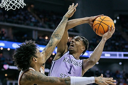 Mar 13, 2024; Kansas City, MO, USA; Kansas State Wildcats forward David N'Guessan (1) shoots the ball during the second half against the Texas Longhorns at T-Mobile Center. Mandatory Credit: William Purnell-USA TODAY Sports