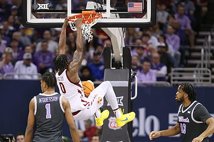 Iowa State senior forward Tre King (0) dunks over Kansas State in the first half of the quarterfinal round in the Big 12 Tournament inside the T-Mobile Center in Kansas City, Mo.