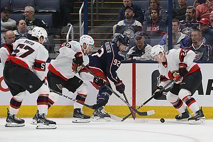 Mar 14, 2024; Columbus, Ohio, USA; Columbus Blue Jackets left wing Alexander Nylander (92) battles with Ottawa Senators defenseman Jacob Bernard-Docker (24) for the puck during the first period at Nationwide Arena. Mandatory Credit: Russell LaBounty-USA TODAY Sports