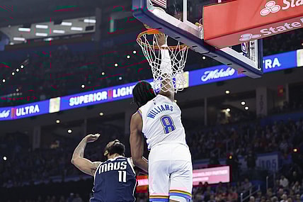 Mar 14, 2024; Oklahoma City, Oklahoma, USA; Oklahoma City Thunder forward Jalen Williams (8) blocks a shot by Dallas Mavericks guard Kyrie Irving (11) during the first half at Paycom Center. Mandatory Credit: Alonzo Adams-USA TODAY Sports