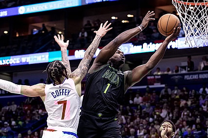 Mar 15, 2024; New Orleans, Louisiana, USA;  New Orleans Pelicans forward Zion Williamson (1) drives to the basket against LA Clippers guard Amir Coffey (7) during the first half at Smoothie King Center. Mandatory Credit: Stephen Lew-USA TODAY Sports