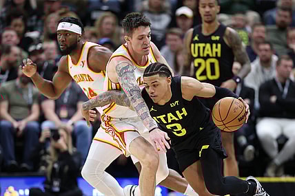 Mar 15, 2024; Salt Lake City, Utah, USA; Utah Jazz guard Keyonte George (3) drives against Atlanta Hawks guard Vit Krejci (27) during the second quarter at Delta Center. Mandatory Credit: Rob Gray-USA TODAY Sports