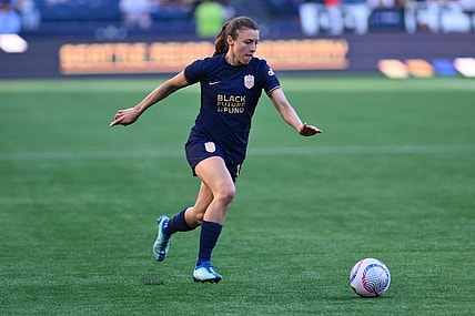 Mar 17, 2024; Seattle, Washington, USA; Seattle Reign defender Sofia Huerta  (11) moves the ball against the Washington Spirit during the second half at Lumen Field. Mandatory Credit: Steven Bisig-USA TODAY Sports