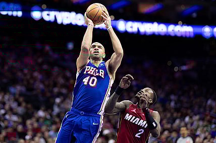 Mar 18, 2024; Philadelphia, Pennsylvania, USA; Philadelphia 76ers forward Nicolas Batum (40) drives for a shot agains Miami Heat guard Terry Rozier (2) during the second quarter at Wells Fargo Center. Mandatory Credit: Bill Streicher-USA TODAY Sports