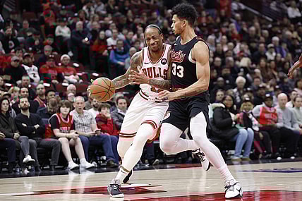 Mar 18, 2024; Chicago, Illinois, USA; Chicago Bulls forward DeMar DeRozan (11) drives to the basket against Portland Trail Blazers forward Toumani Camara (33) during the first half at United Center. Mandatory Credit: Kamil Krzaczynski-USA TODAY Sports