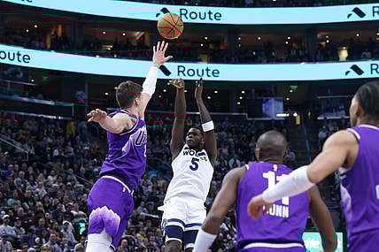Mar 18, 2024; Salt Lake City, Utah, USA; Minnesota Timberwolves guard Anthony Edwards (5) shoots over Utah Jazz center Walker Kessler (24) during the fourth quarter at Delta Center. Mandatory Credit: Rob Gray-USA TODAY Sports