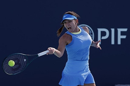 Mar 19, 2024; Miami Gardens, FL, USA; Simona Halep (ROU) hits a forehand against Paula Badosa (ESP) (not pictured) on day two of the Miami Open at Hard Rock Stadium. Mandatory Credit: Geoff Burke-USA TODAY Sports