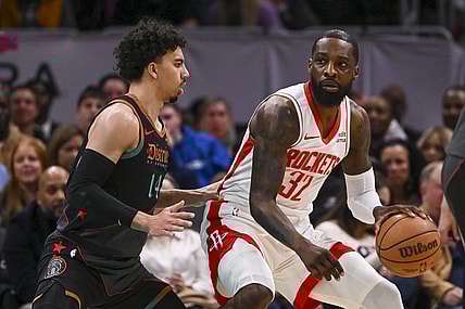 Mar 19, 2024; Washington, District of Columbia, USA; Houston Rockets forward Jeff Green (32) dribbles a sWashington Wizards guard Jules Bernard (14) defends during the first half  at Capital One Arena. Mandatory Credit: Tommy Gilligan-USA TODAY Sports