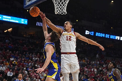 South Dakota State's guard Kalen Garry (10) is blocked by Iowa State's forward Robert Jones (12) during the first half on Thursday, March 21, 2024 at the CHI Health Center in Omaha, Nebraska.