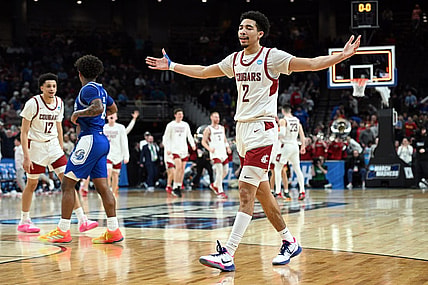 Mar 21, 2024; Omaha, NE, USA; Washington State Cougars guard Myles Rice (2) celebrates after defeating the Drake Bulldogs in the first round of the 2024 NCAA Tournament at CHI Health Center Omaha. Mandatory Credit: Steven Branscombe-USA TODAY Sports
