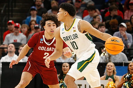 Mar 22, 2024; Memphis, TN, USA;  Baylor Bears guard RayJ Dennis (10) dribbles against Colgate Raiders guard Braeden Smith (2) during the second half of the NCAA Tournament First Round at FedExForum. Mandatory Credit: Petre Thomas-USA TODAY Sports