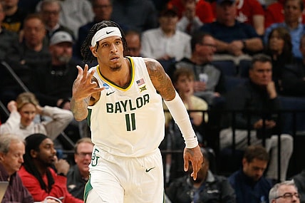 Mar 22, 2024; Memphis, TN, USA; Baylor Bears forward Jalen Bridges (11) reacts after a three-point shot against the Colgate Raiders during the second half of the NCAA Tournament First Round at FedExForum. Mandatory Credit: Petre Thomas-USA TODAY Sports