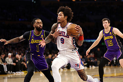 Mar 22, 2024; Los Angeles, California, USA;  Philadelphia 76ers guard Kelly Oubre Jr. (9) drives to the basket against Los Angeles Lakers guard D'Angelo Russell (1) during the first quarter at Crypto.com Arena. Mandatory Credit: Kiyoshi Mio-USA TODAY Sports