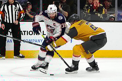 Mar 23, 2024; Las Vegas, Nevada, USA; Vegas Golden Knights defenseman Zach Whitecloud (2) breaks up a scoring attempt during the first period at T-Mobile Arena. Mandatory Credit: Stephen R. Sylvanie-USA TODAY Sports