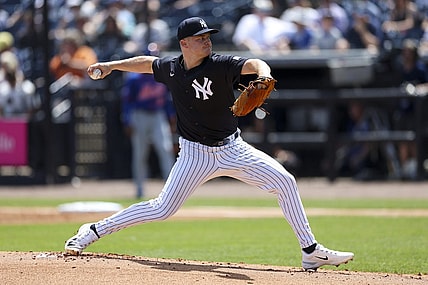 Mar 25, 2024; Tampa, Florida, USA;  New York Yankees starting pitcher Clarke Schmidt (36) throws a pitch against the New York Mets in the first inning at George M. Steinbrenner Field. Mandatory Credit: Nathan Ray Seebeck-USA TODAY Sports