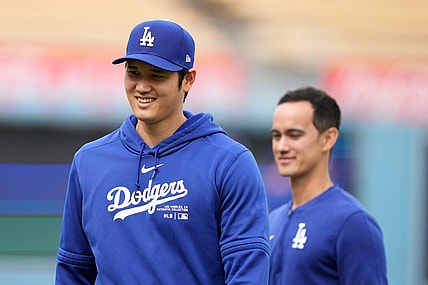 Mar 25, 2024; Los Angeles, California, USA; Los Angeles Dodgers designated hitter Shohei Ohtani (left) and interpreter Will Ireton before the game against the Los Angeles Angels at Dodger Stadium. Mandatory Credit: Kirby Lee-USA TODAY Sports