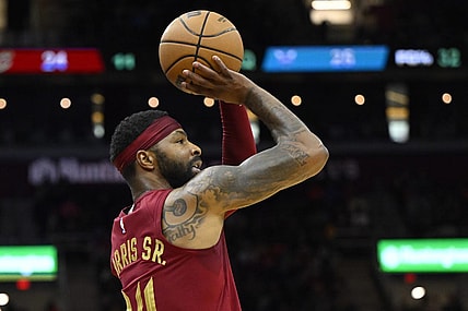 Mar 25, 2024; Cleveland, Ohio, USA; Cleveland Cavaliers forward Marcus Morris Sr. (24) shoots in the second quarter against the Charlotte Hornets at Rocket Mortgage FieldHouse. Mandatory Credit: David Richard-USA TODAY Sports