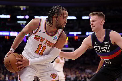 Mar 25, 2024; New York, New York, USA; New York Knicks guard Jalen Brunson (11) controls the ball against Detroit Pistons forward Buddy Boeheim (35) during the second quarter at Madison Square Garden. Mandatory Credit: Brad Penner-USA TODAY Sports