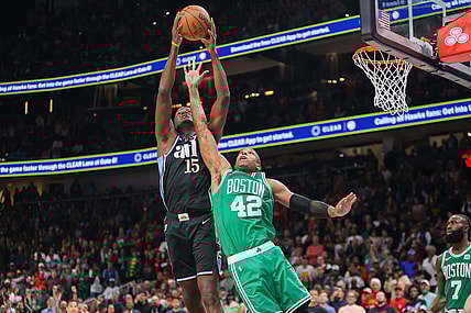 Mar 25, 2024; Atlanta, Georgia, USA; Atlanta Hawks center Clint Capela (15) grabs a rebound over Boston Celtics center Al Horford (42) in the second half at State Farm Arena. Mandatory Credit: Brett Davis-USA TODAY Sports