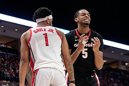 Mar 26, 2024; Columbus, OH, USA; Georgia Bulldogs center Frank Anselem-Ibe (5) reacts to a missed rebound beside Ohio State Buckeyes guard Roddy Gayle Jr. (1) during the first half of the NIT quarterfinals at Value City Arena.